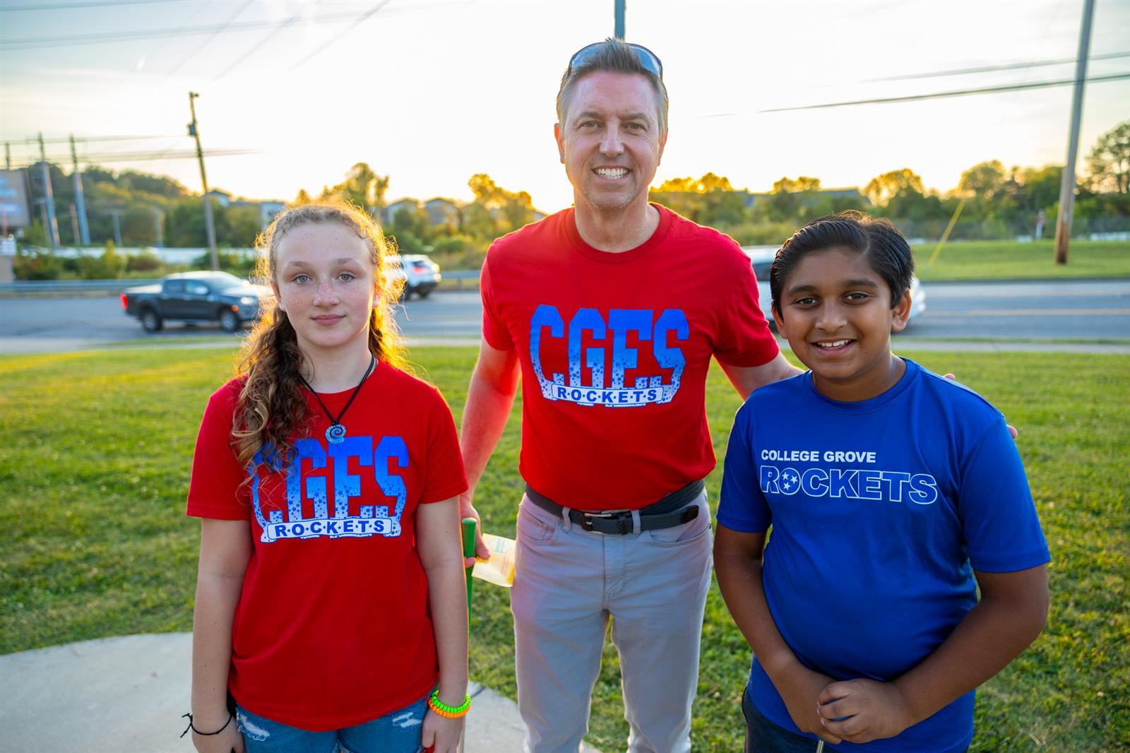vice principal and students at mini golf